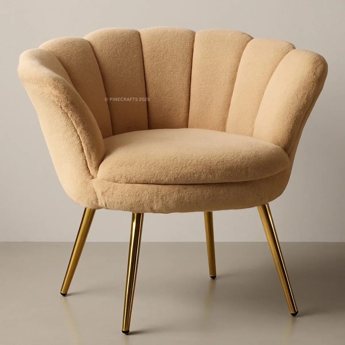 Beige armchair with gold legs on a plain background